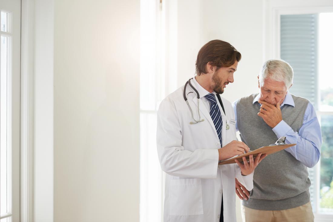 Doctor explaining something to a patient