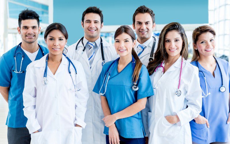 A group of doctors standing together in their uniforms